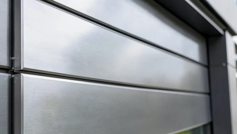 Solid aluminum cladding on a transport station building