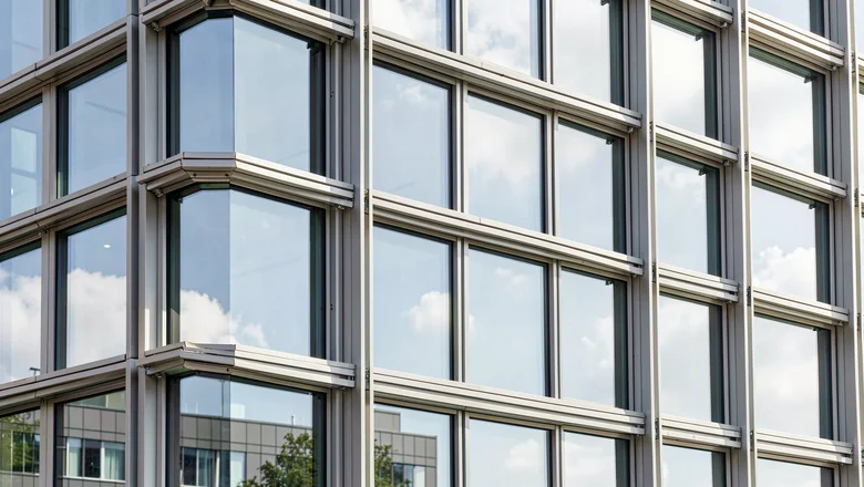 Detail of unitised curtain wall mullions, transoms and insulated glass unit